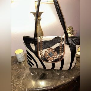 Kurtman Zebra HOH and black leather tote